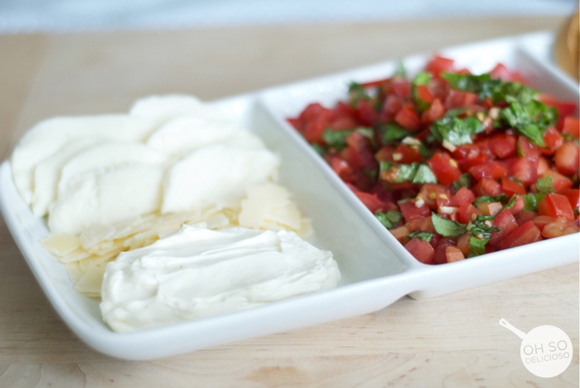 A close up of mozzarella and parmesan for making an easy bruschetta bar